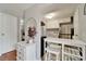 View of the kitchen featuring white cabinets and stainless steel appliances at 4215 E Bay Dr # 1801E, Clearwater, FL 33764