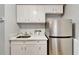 Kitchen area with quartz counters and stainless steel refrigerator at 4215 E Bay Dr # 1801E, Clearwater, FL 33764