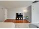 Bright living room with hardwood floors, television, and decorative touches creating a comfortable atmosphere at 4215 E Bay Dr # 1801E, Clearwater, FL 33764