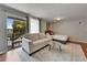 Combined living space with balcony access and queen size bed at 4215 E Bay Dr # 1801E, Clearwater, FL 33764