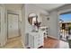Hallway with white dresser and view of the outdoor patio at 4215 E Bay Dr # 1801E, Clearwater, FL 33764