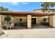 Community patio area with tables and chairs provides an ideal space for outdoor dining and socializing at 4215 E Bay Dr # 1801E, Clearwater, FL 33764