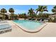 A clear view of the sparkling pool, set amongst lush landscaping, complete with lounge chairs for relaxation at 4215 E Bay Dr # 1801E, Clearwater, FL 33764