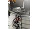 This garage features overhead storage racks and a bike rack at 4338 Banjo Lake Rd, Land O Lakes, FL 34639