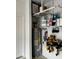 This garage features ample wall storage solutions and an updated water heater at 4338 Banjo Lake Rd, Land O Lakes, FL 34639