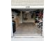 Attached garage featuring organization, storage, and workspace at 4338 Banjo Lake Rd, Land O Lakes, FL 34639