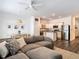 Open-concept living space connects to the kitchen, featuring a large sectional at 4338 Banjo Lake Rd, Land O Lakes, FL 34639