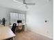 Bright home office with multiple desks near the window, offering ample workspace and natural light at 4338 Banjo Lake Rd, Land O Lakes, FL 34639