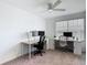 Bright home office featuring dual desk areas, a ceiling fan and ample natural light from the window at 4338 Banjo Lake Rd, Land O Lakes, FL 34639