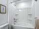 Bright bathroom with a clean shower and tub combo at 4338 Banjo Lake Rd, Land O Lakes, FL 34639