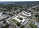 Aerial view of a community with well-maintained landscaping, parking, and several buildings at 5720 13Th N Ave # 207B, St Petersburg, FL 33710