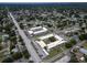 An aerial view showcases the well-maintained apartment complex in a vibrant neighborhood setting at 5720 13Th N Ave # 207B, St Petersburg, FL 33710