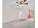 Empty bedroom with ceiling fan. Adjoining room view at 5720 13Th N Ave # 207B, St Petersburg, FL 33710