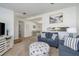 Open floor plan showcasing the living room, dining area, and a glimpse of the kitchen at 630 Kirkland Cir, Dunedin, FL 34698