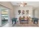 Relaxing living room showcasing a sliding glass door and tasteful furnishings at 6603 S Juanita St, Tampa, FL 33616