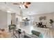 Open living space combining a modern kitchen, dining area, and welcoming living room at 6603 S Juanita St, Tampa, FL 33616