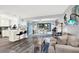 Open-concept living area connecting the kitchen, dining, and living spaces at 7305 Jasmine Blvd, Port Richey, FL 34668