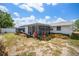 Backyard showing the patio, plants, and fence at 7415 Ingleside Dr, Port Richey, FL 34668