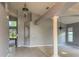 Elegant dining room with stylish lighting and neutral tones at 7705 Nottinghill Sky Dr, Apollo Beach, FL 33572