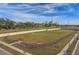 Community dog park with benches and fenced area for furry friends to play at 8174 Wheat Stone Dr, Zephyrhills, FL 33540