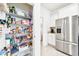 Walk-in pantry with wire shelving offering lots of storage space at 8174 Wheat Stone Dr, Zephyrhills, FL 33540