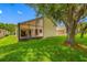 The backyard has a screened lanai that is perfect for outdoor relaxation and entertaining at 9751 Conservation Dr, New Port Richey, FL 34655