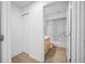 Bathroom featuring a tub and shower combination and wood-look floors at 9751 Conservation Dr, New Port Richey, FL 34655