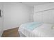 Bedroom with plush carpet and a closet view of the bedroom at 9751 Conservation Dr, New Port Richey, FL 34655