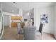 Open-concept kitchen and dining area with natural light and modern decor at 9751 Conservation Dr, New Port Richey, FL 34655
