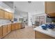 Bright kitchen with stainless steel appliances, and an adjoining dining area at 9751 Conservation Dr, New Port Richey, FL 34655