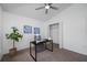 Bright office space with closet, ceiling fan and cozy work space at 9751 Conservation Dr, New Port Richey, FL 34655