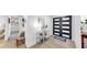 Bright foyer featuring modern double doors, stylish decor, and wood-look tile flooring at 9903 Saddle Rd, Tampa, FL 33626
