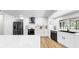 Modern kitchen with stainless steel appliances, large countertop, and ample cabinet space at 9903 Saddle Rd, Tampa, FL 33626