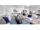 Spacious living room featuring stylish furniture and a view of the dining area at 9903 Saddle Rd, Tampa, FL 33626