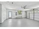 Spacious two car garage features an entrance and window at 1443 54Th Ne Ave, St Petersburg, FL 33703