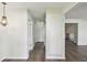 Bright hallway showcasing the home's neutral color palette and connecting various living spaces at 1443 54Th Ne Ave, St Petersburg, FL 33703