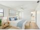 Relaxing main bedroom with en-suite bathroom, neutral paint, and soft furnishings at 1443 54Th Ne Ave, St Petersburg, FL 33703