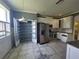 Bright kitchen with stainless steel appliances, ample cabinet space, and a subway tile backsplash at 1015 Windton Oak Dr, Ruskin, FL 33570