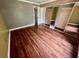 Bedroom featuring hardwood floors, and view of the closet and entrance to another room at 1025 82Nd N Ter # 1025D, St Petersburg, FL 33702