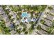 Aerial view of community amenities featuring a pool and clubhouse at 12004 Legacy Bright St, Riverview, FL 33578