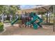 A fun playground with slides, climbing structures, and shade canopy at 12004 Legacy Bright St, Riverview, FL 33578