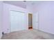 Bright bedroom with carpeted floors and closet at 1208 Carriage Park Dr, Valrico, FL 33594