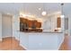 Kitchen with granite countertops and pendant lighting is perfect for entertaining guests at 1208 Carriage Park Dr, Valrico, FL 33594