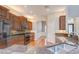 Stylish kitchen with stainless appliances and granite countertops is a chef's dream at 1208 Carriage Park Dr, Valrico, FL 33594