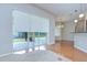 Bright living area with large sliding glass doors leading to the backyard patio at 1208 Carriage Park Dr, Valrico, FL 33594