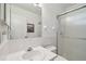 Clean bathroom featuring a vanity with white sink and a glass enclosed shower at 1270 Inverness, Dunedin, FL 34698