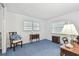 Bright bedroom with classic furnishings and natural light streaming through the windows at 1270 Inverness, Dunedin, FL 34698