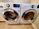 Close-up of modern, high-efficiency front-loading LG washer and dryer at 12862 Rangeland Blvd, Odessa, FL 33556