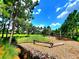 Natural community playground with climbing structures and wood-chip ground cover at 12862 Rangeland Blvd, Odessa, FL 33556