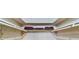 Organized closet featuring ample storage space with multiple shelves and hanging rods at 13029 111Th Ln, Largo, FL 33778